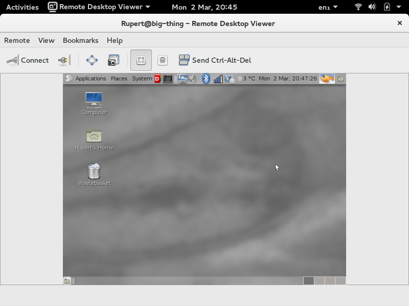 Remote Desktop Viewer running in GNOME 3, connected to a machine
      running GNOME 2